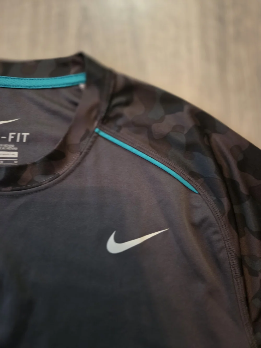 Nike Men’s Black Camo Performance Dri-FIT Tee with Teal Accents